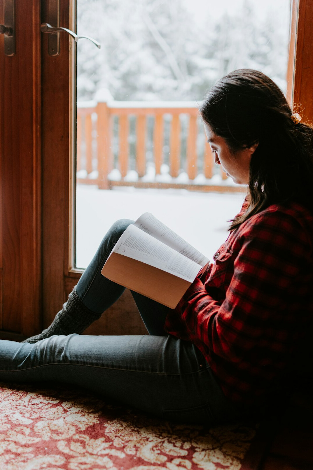 person reading mystery book